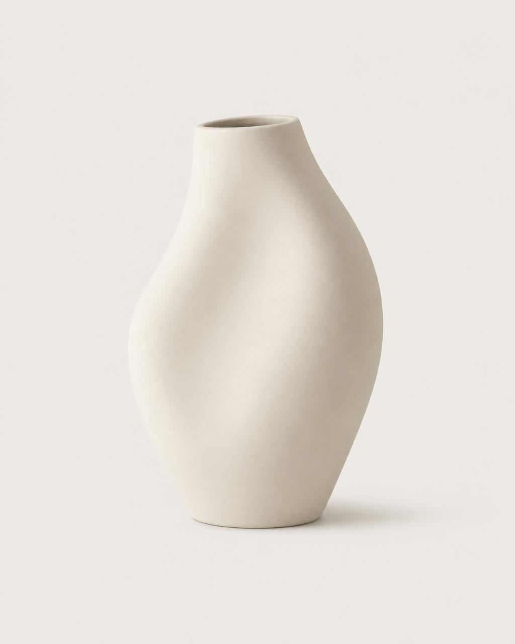 Matte off-white ceramic vase with sculptural organic form